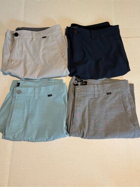 4 pair Travis Mathew men’s shorts size 36 light grey, grey, light blue, navy